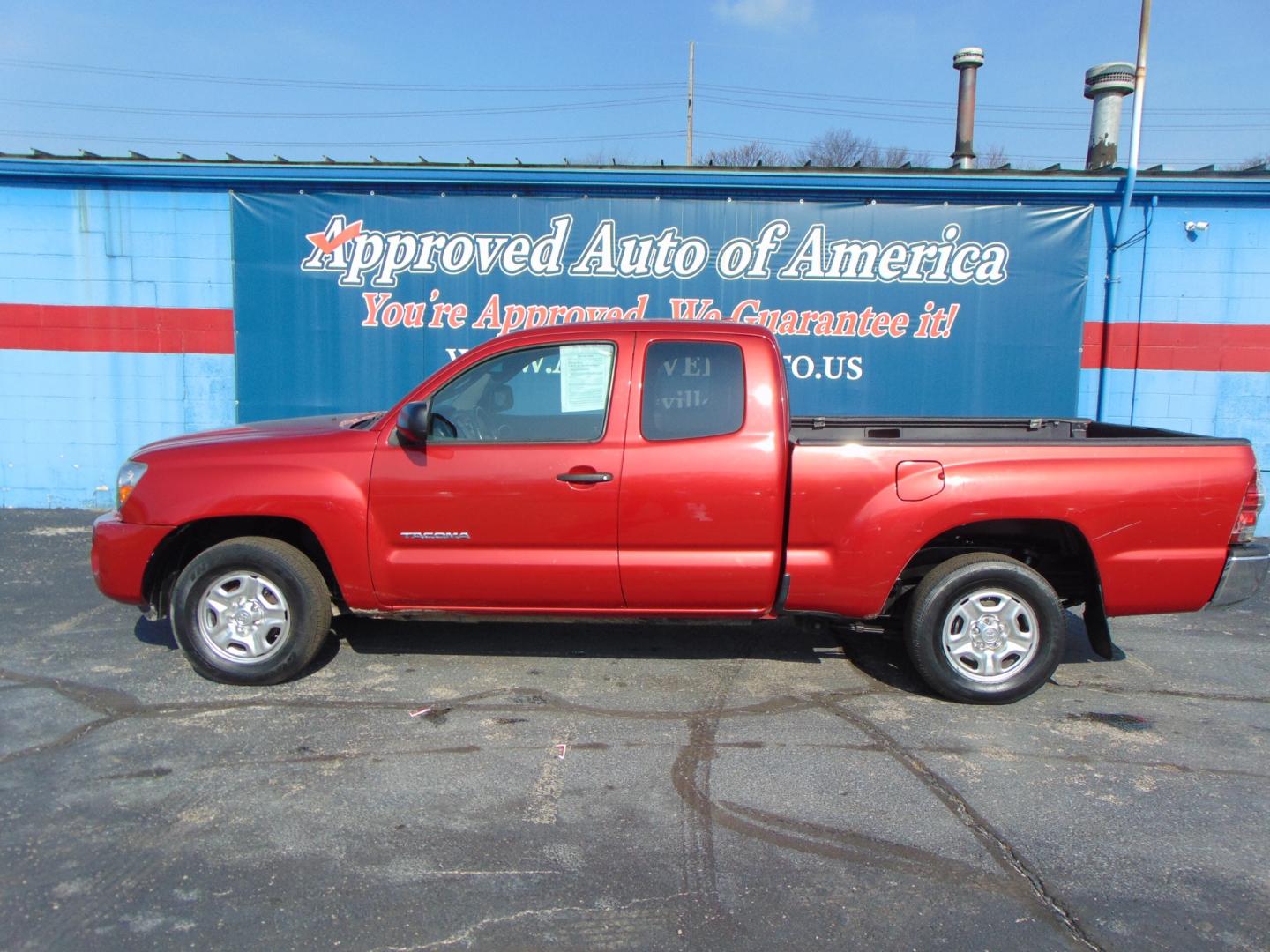 2009 Red Toyota Tacoma Access Cab (5TETX22N49Z) with an 4-Cyl 2.7 Liter engine, Manual, 5-Spd w/Overdrive transmission, located at 2105 Dixie Hwy, Louisville, KY, 40210, (502) 772-3333, 38.220932, -85.795441 - Photo#0